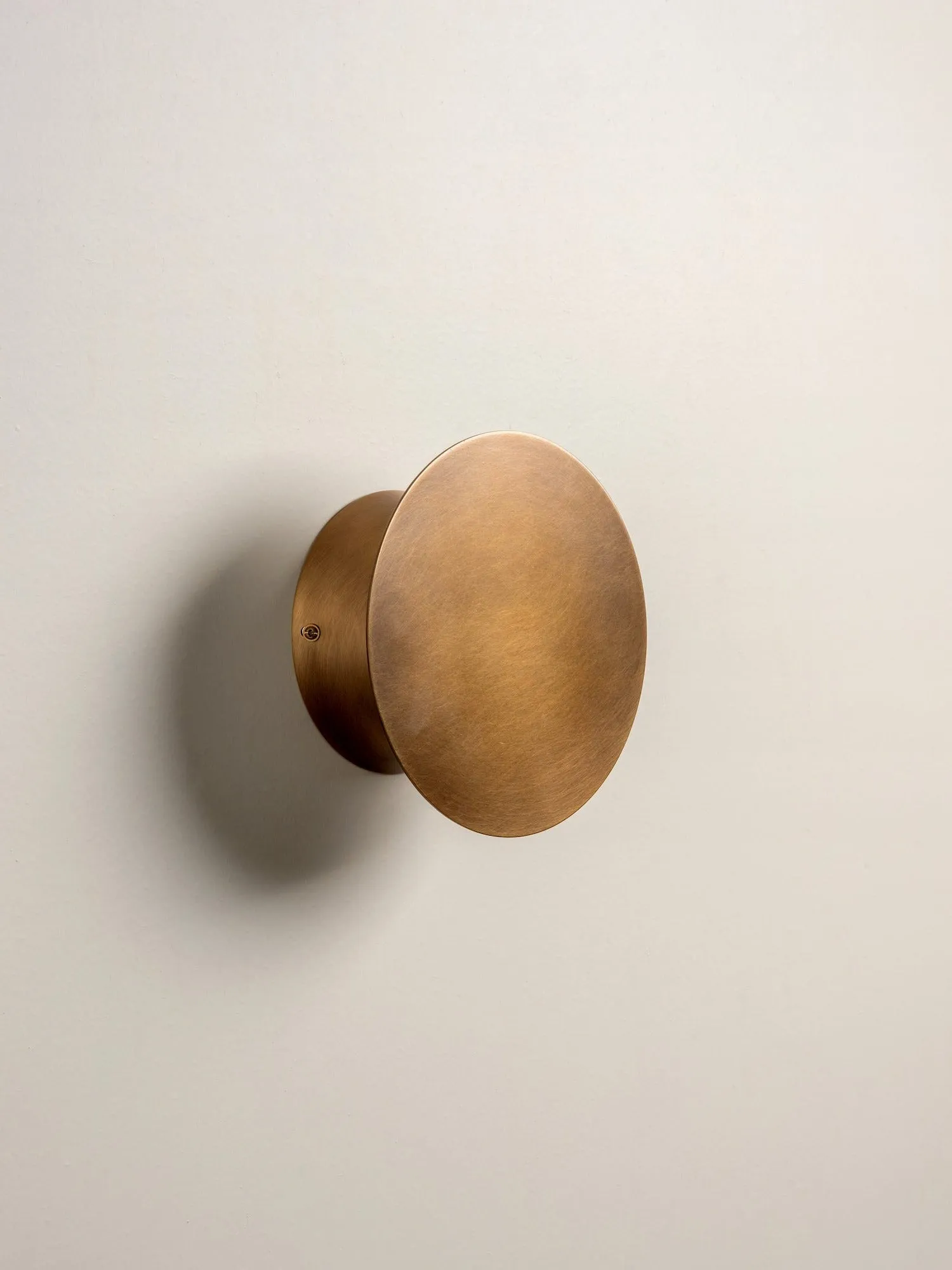 Santi - LED adjustable aged brass disc wall light
